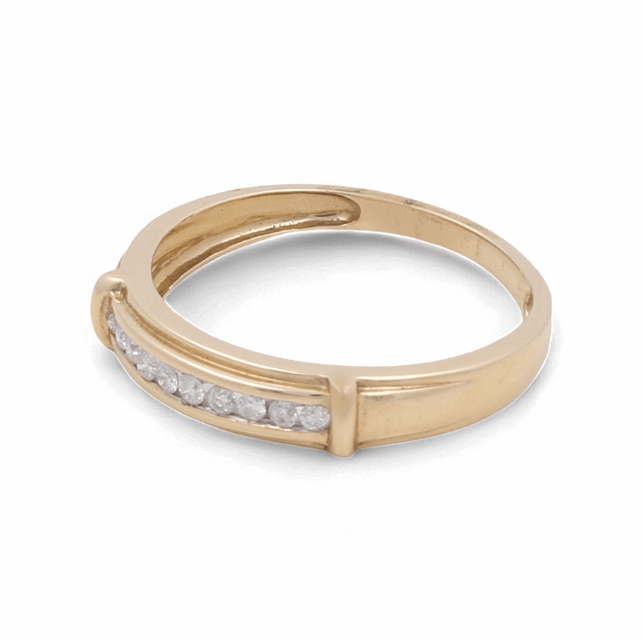 The Miral Jewelry 14K Yellow Gold Bridal Men Ring with Diamonds is a stunning wedding band, featuring a row of small diamonds set in the middle.