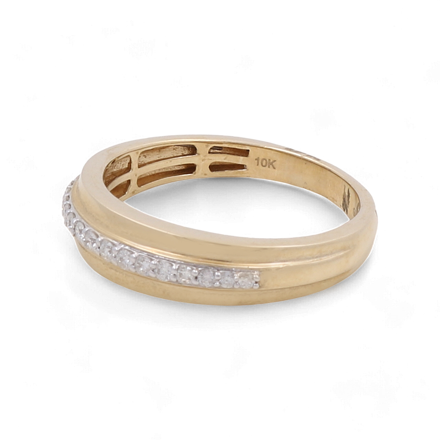 A stunning 10K Yellow Gold Bridal Woman Ring with Diamonds from Miral Jewelry, featuring a row of small diamonds elegantly set along a curved band.