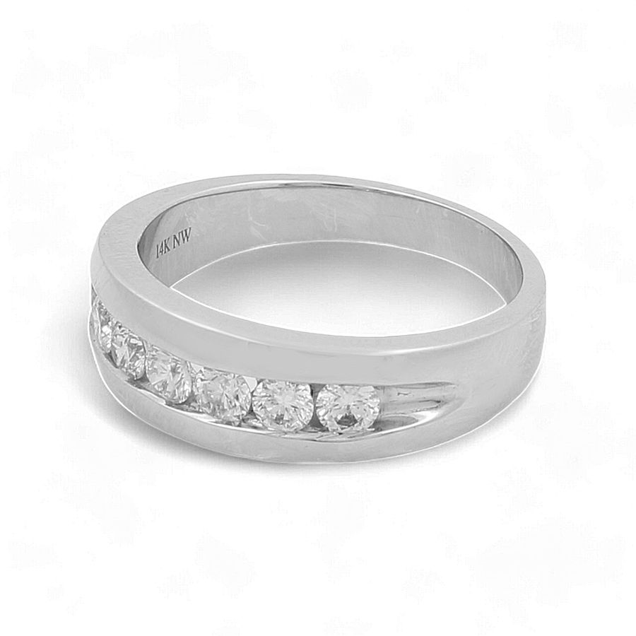 The Miral Jewelry 14K White Gold Bridal Men Ring with Diamonds features a luxurious band of five embedded small diamonds.