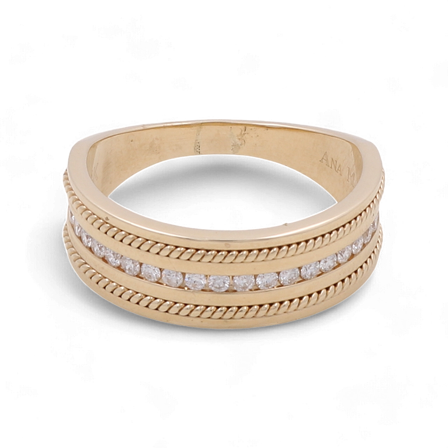 The 14K Yellow Gold Bridal Men Ring with Diamonds by Miral Jewelry boasts a row of small diamonds encased between two bands of twisted gold detail.