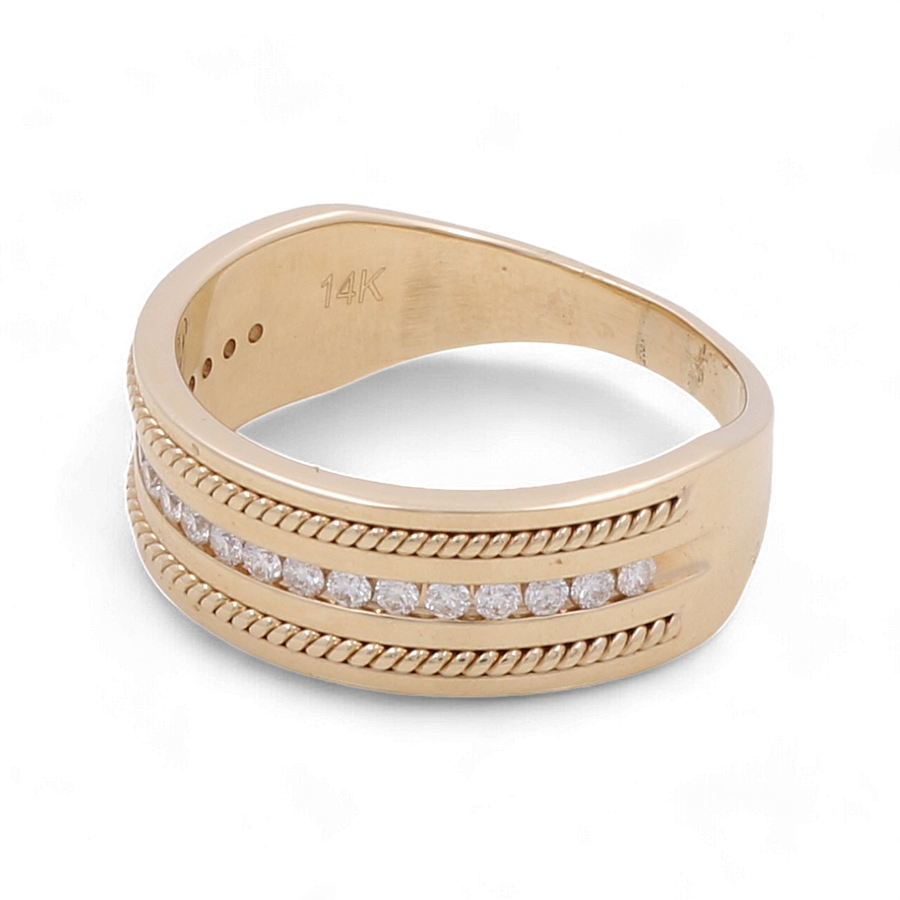 The Miral Jewelry 14K Yellow Gold Bridal Men Ring with Diamonds showcases two rows of small diamonds elegantly set between intricate twisted rope designs on the band.