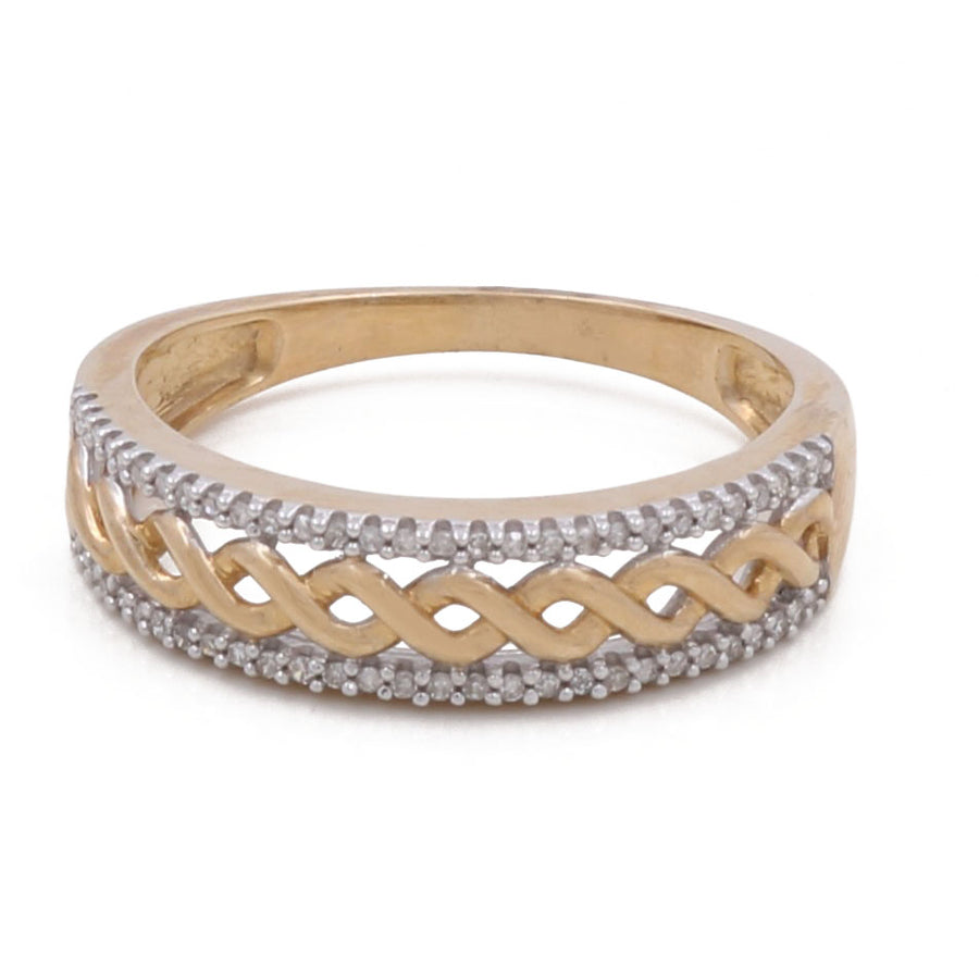 A close-up image of the Miral Jewelry 10K Yellow Gold Bridal Men Ring with Diamonds, showcasing a twisted rope design in the center, bordered by small diamonds on both edges.