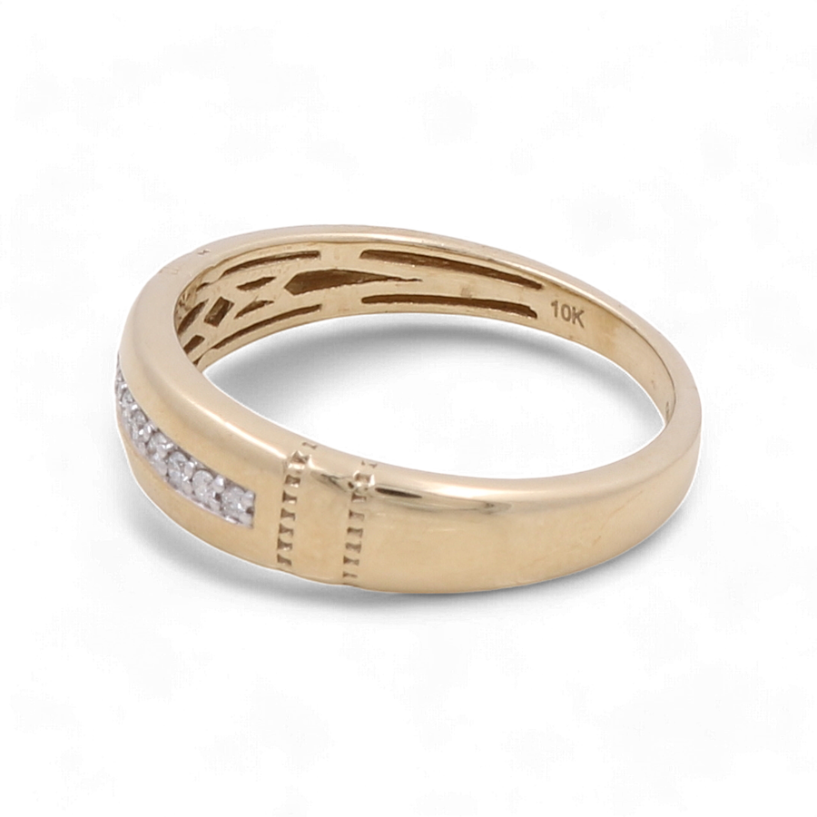 A 10K Yellow Gold Bridal Men Ring with Diamonds by Miral Jewelry, featuring 0.50 carat diamonds arranged in a line.