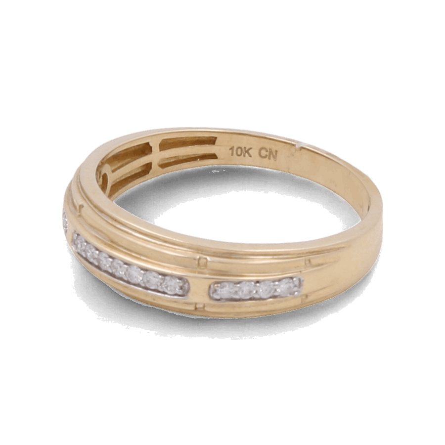 The Miral Jewelry 10K Yellow Gold Bridal Men's Ring with Diamonds features a row of small circular white stones set in a horizontal band. The inside of the ring is engraved with "10K CN". This certified piece complements any collection beautifully, adding a touch of elegance and grace.