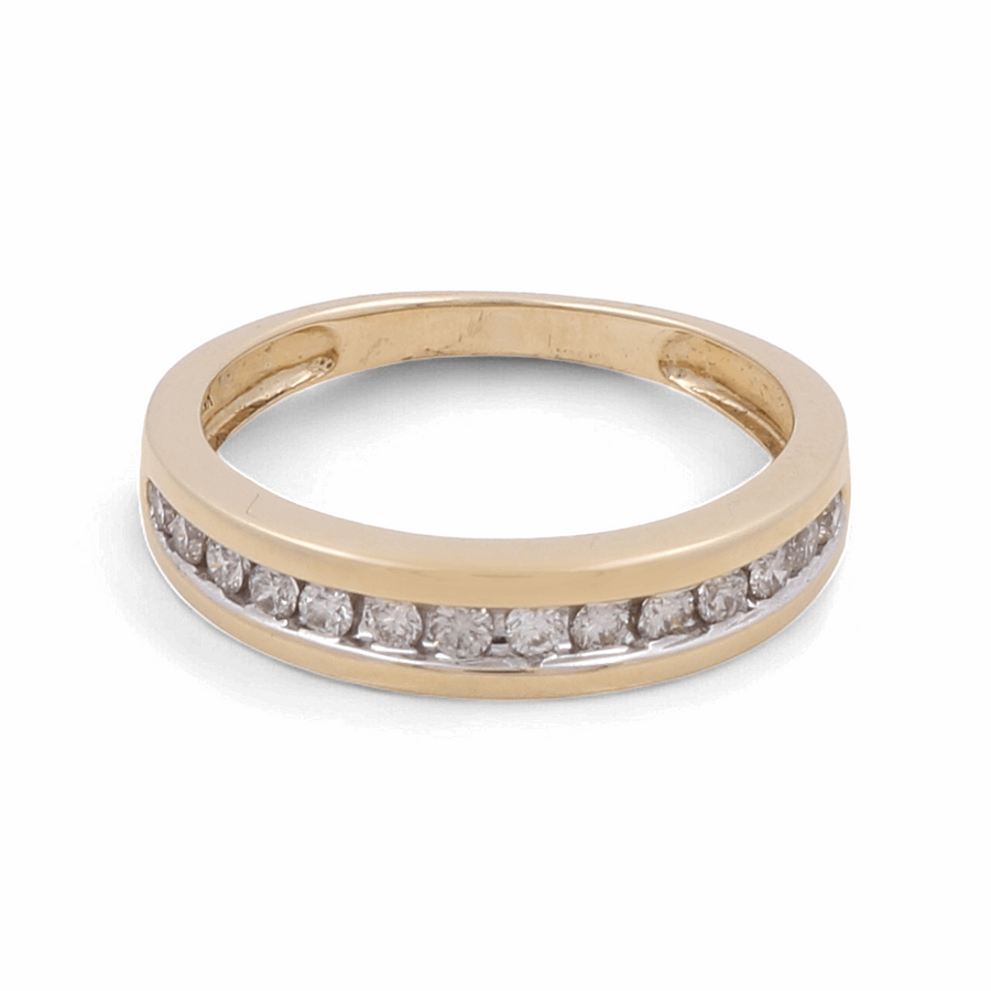 The Miral Jewelry 10K Yellow Gold Bridal Men Ring with Diamonds is a stylish piece featuring a row of small, clear diamonds set in a channel around the band. It's perfect for a bridal selection that exudes timeless elegance.