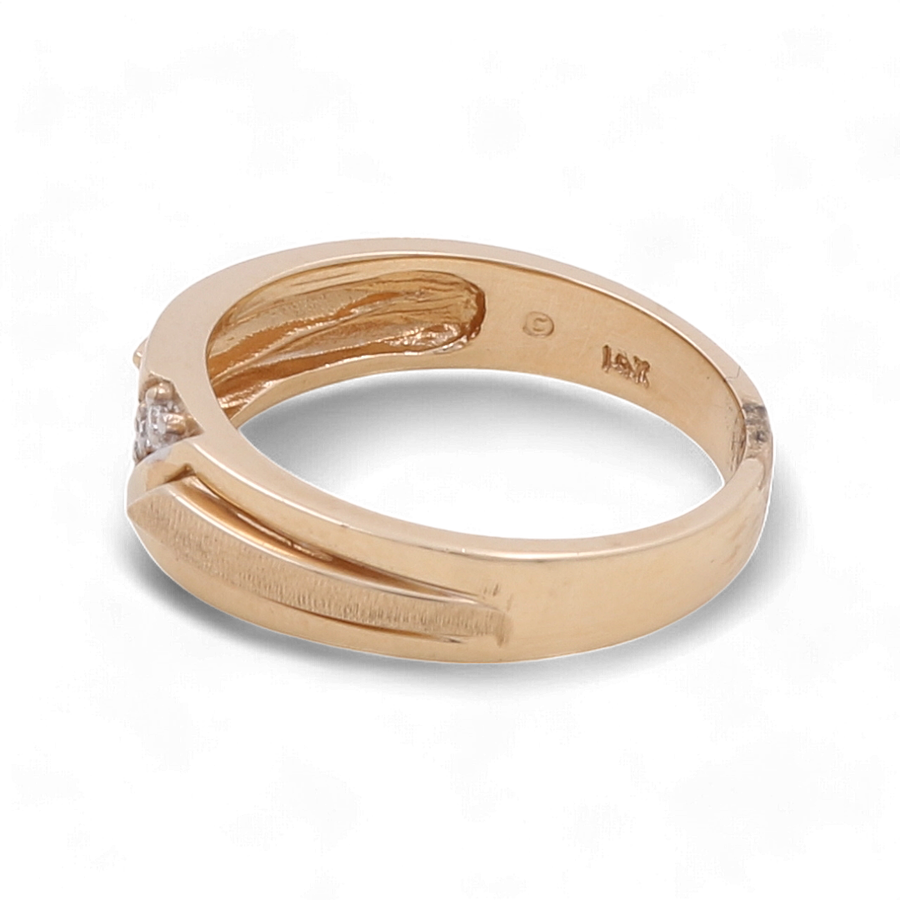 A 14K Yellow Gold Bridal Men Ring with a diamond setting and an open gap design along the band, engraved with "18K" on the interior, brought to you by Miral Jewelry.