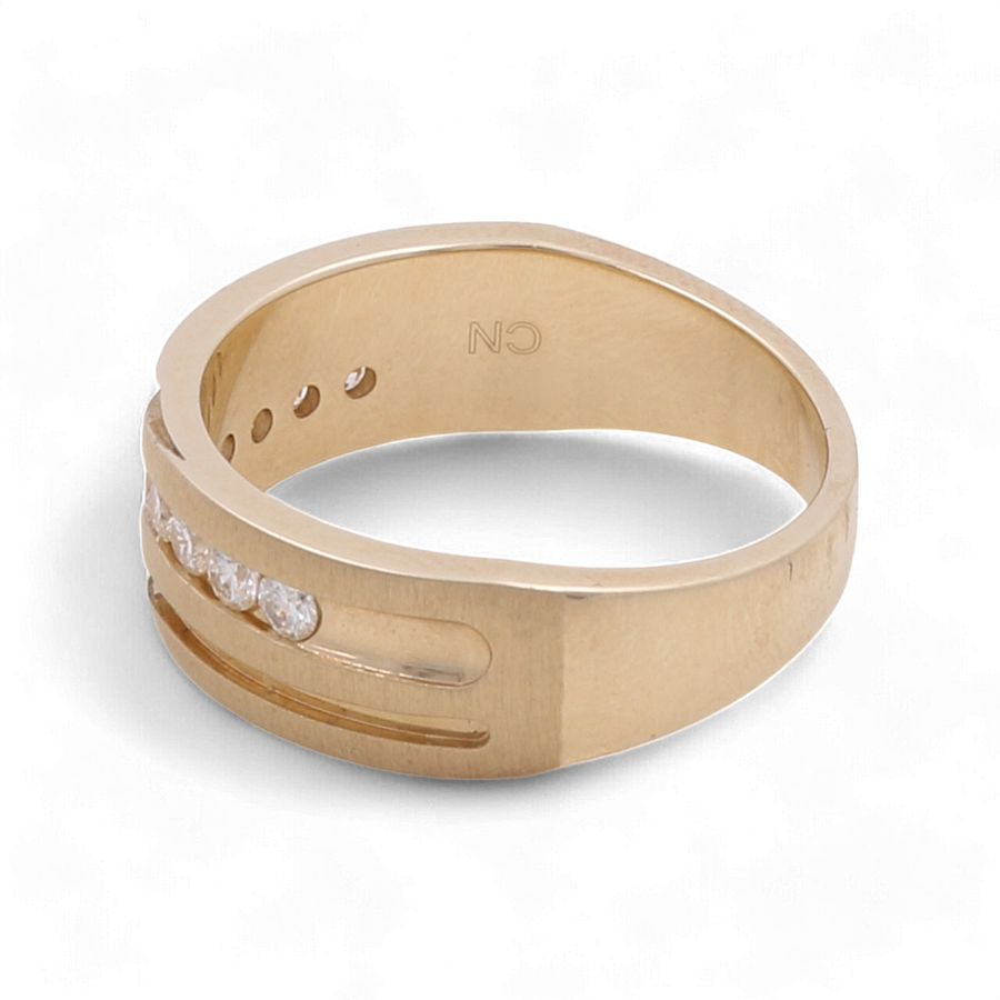 The 10K Yellow Gold Bridal Men Ring with Diamonds by Miral Jewelry is a stunning piece, featuring embedded diamonds and the initials "CN" engraved on the inner band.