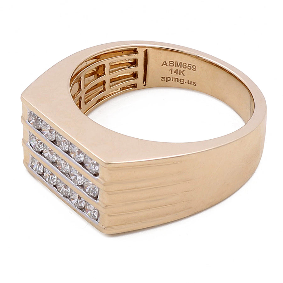 A luxury jewelry piece, this 14k Yellow Gold Fashion Ring with 0.77Tw Round Diamonds by Miral Jewelry boasts a rectangular top, adorned with a triple row of small square-cut diamonds along one side. The inside is inscribed with "ABM659 14K apmg.us", exemplifying exquisite craftsmanship.