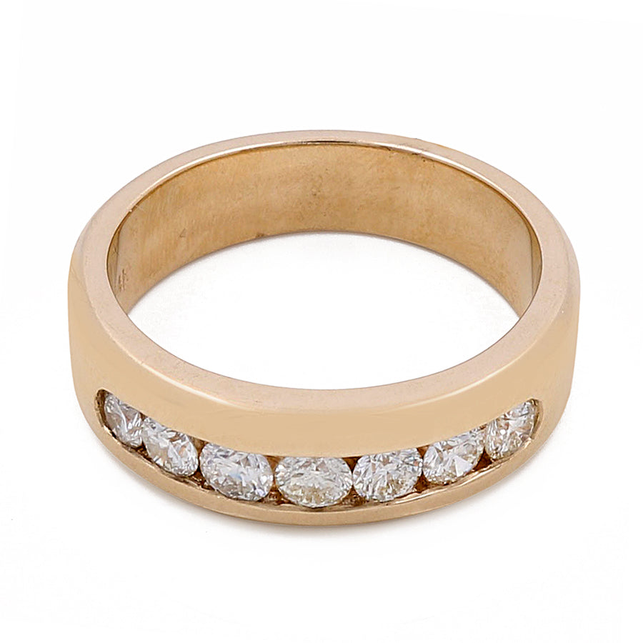 Miral Jewelry 14k Yellow Gold Fashion Ring with 1.00Tw Round Diamonds featuring seven round diamonds embedded in a straight line.