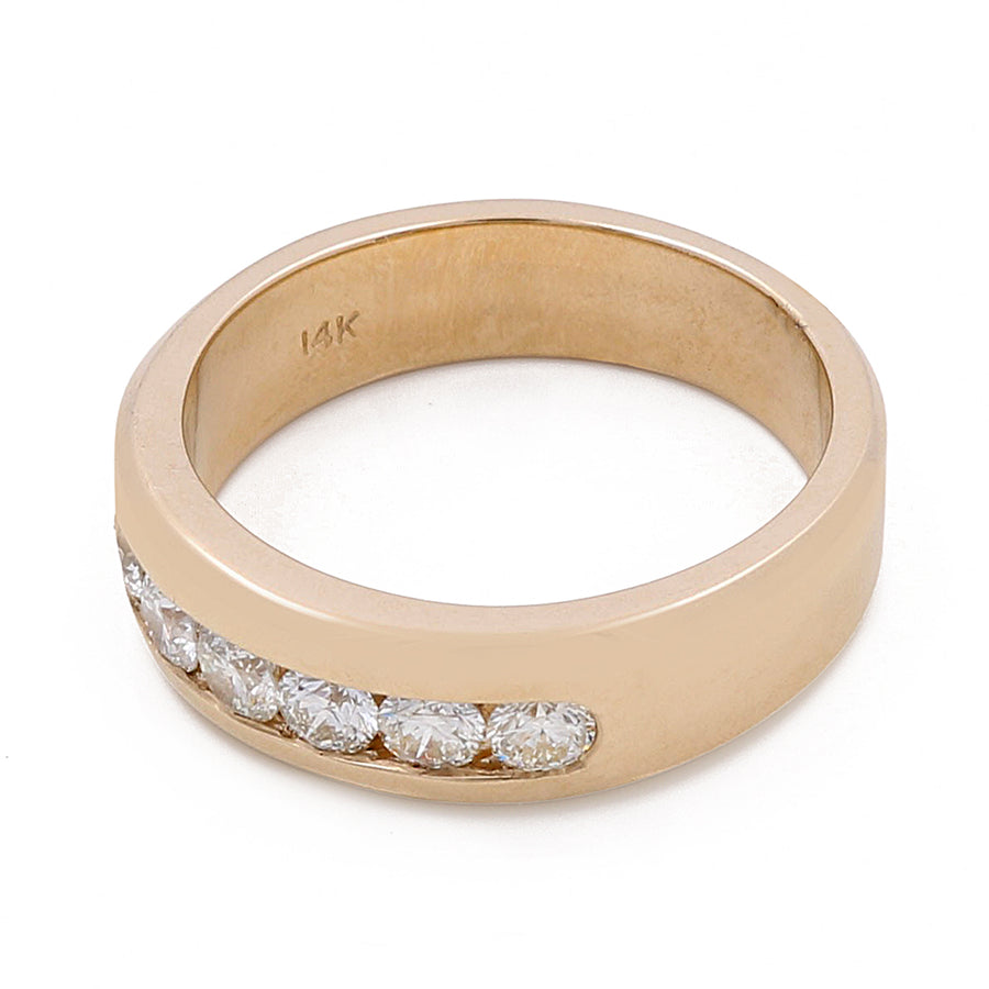 A **Miral Jewelry 14k Yellow Gold Fashion Ring with 1.00Tw Round Diamonds**, featuring a gold band with a 14K stamp and five horizontally set round diamonds.