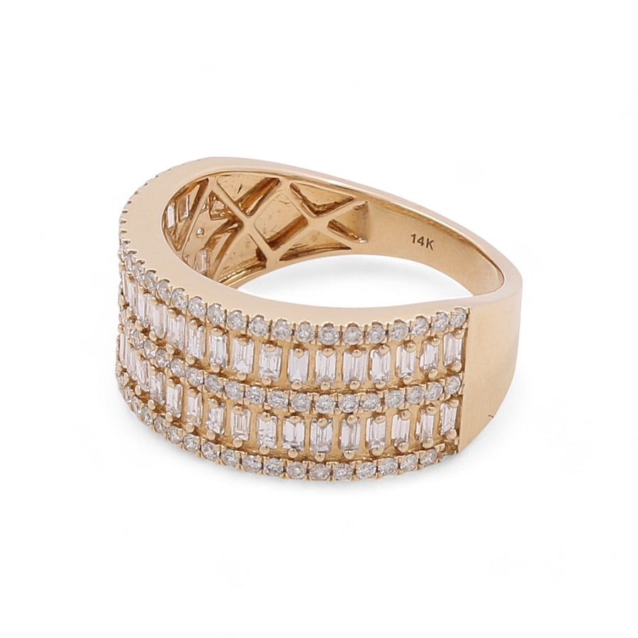 14K yellow gold ring from Miral Jewelry, adorned with three rows of dazzling rectangular and round diamonds.