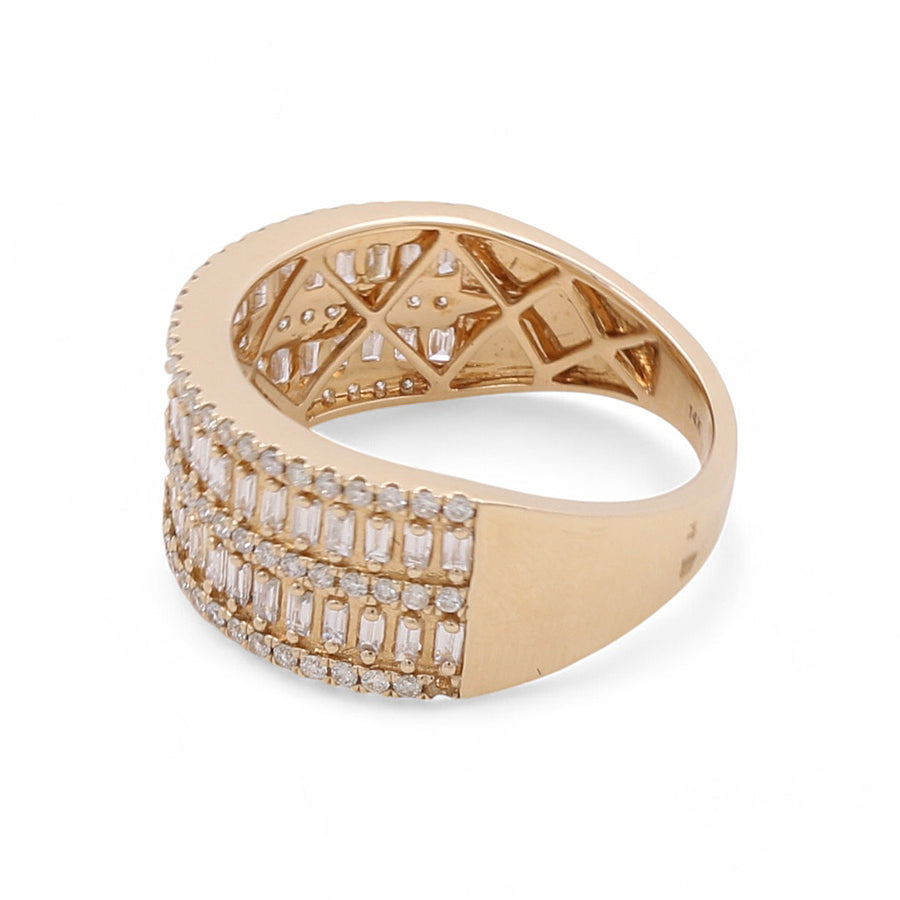 This classic piece from Miral Jewelry, the 14K Yellow Gold Fashion Diamond Women's Ring, showcases multiple rows of dazzling rectangular and round-cut diamonds intricately set on one side while maintaining a smooth surface on the other.