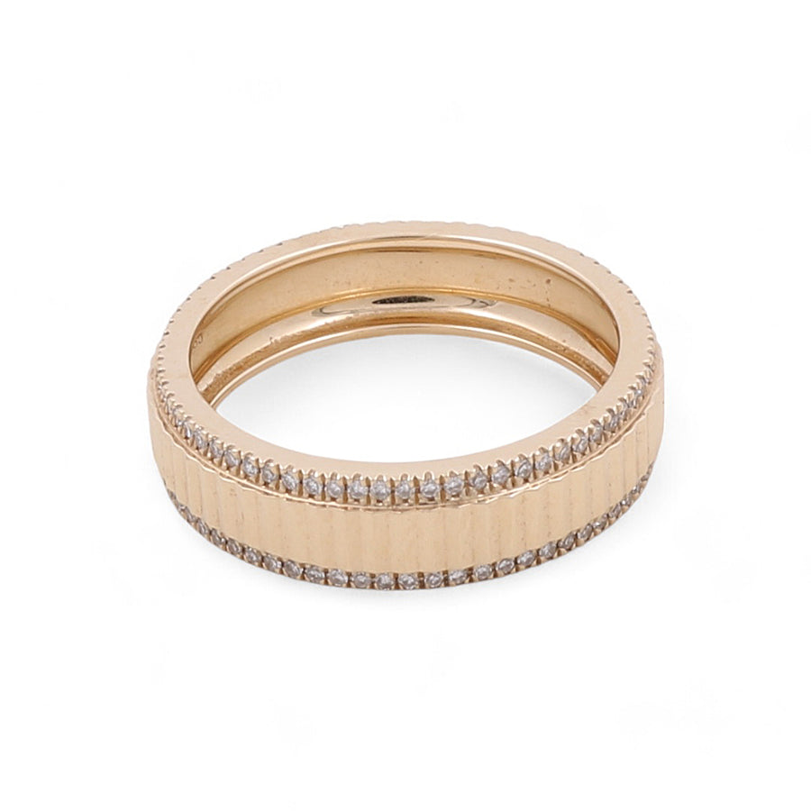 The Miral Jewelry 14K Yellow Gold Fashion Diamond Women's Ring features a grooved band adorned with two rows of small, clear gemstones along the edges, all set against a plain white background.