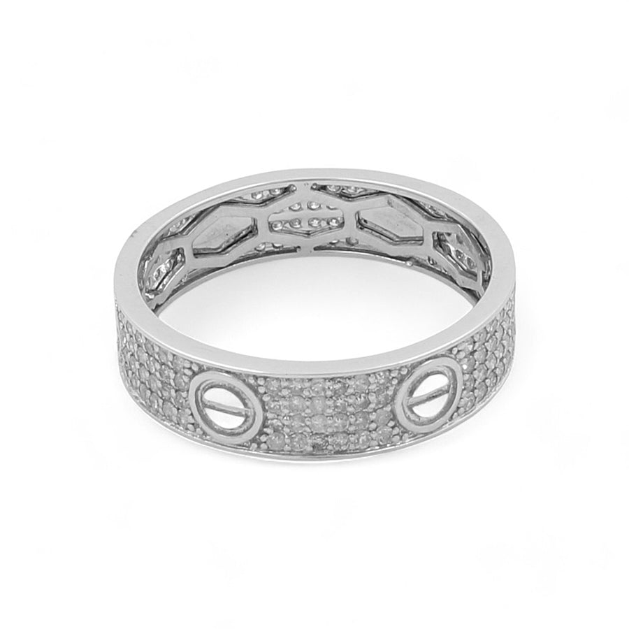 The 14K White Gold Fashion Diamond Women's Ring by Miral Jewelry is a beautiful piece featuring a silver-toned textured surface with a hexagonal pattern inside and two screw-head designs on its outer band.