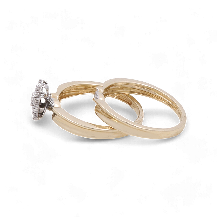 The image shows two 10K yellow gold bridal rings from Miral Jewelry side by side on a white background. One ring is simple and plain, while the other is a 10K Yellow Gold Bridal Woman Ring with Diamonds adorning its top.