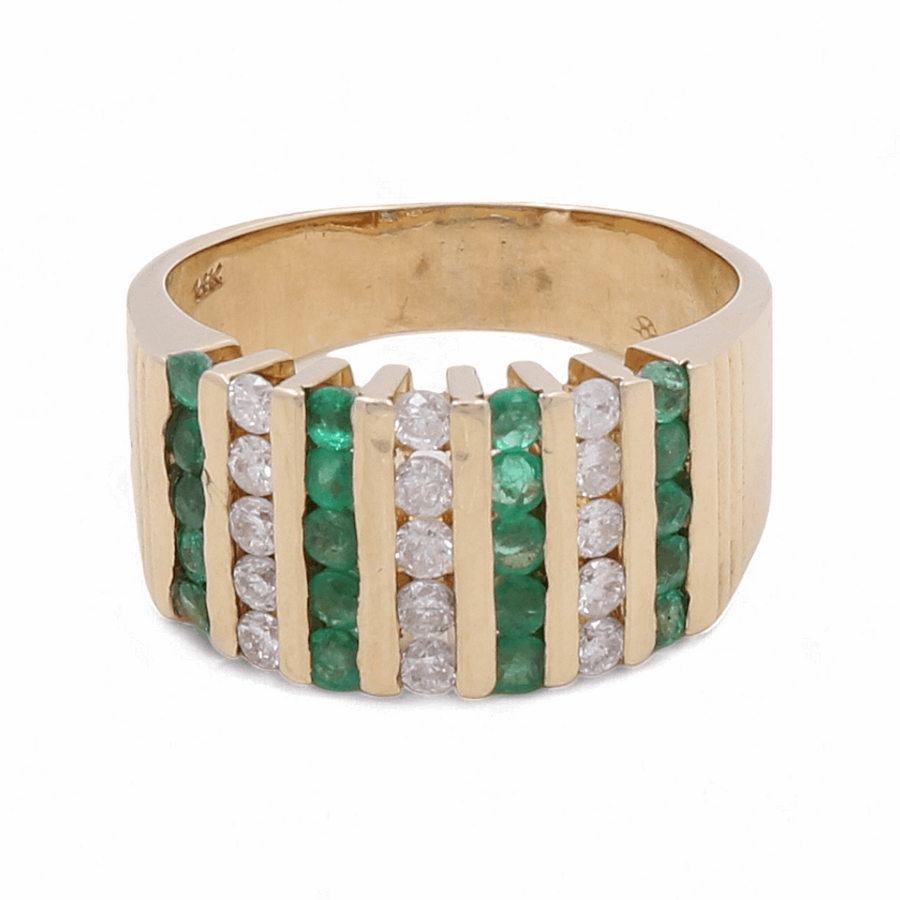 The Miral Jewelry 14K Yellow Gold Diamond Fashion Woman Ring features alternating vertical rows of emeralds and diamonds arranged in a geometric pattern, showcasing certified quality craftsmanship.