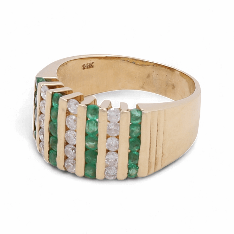 The 14K Yellow Gold Fashion Diamond and Stone Woman Ring by Miral Jewelry is an exquisite piece of fashion jewelry, featuring alternating rows of green emeralds and white diamonds set in a stepped design, marked "14K" inside the band.