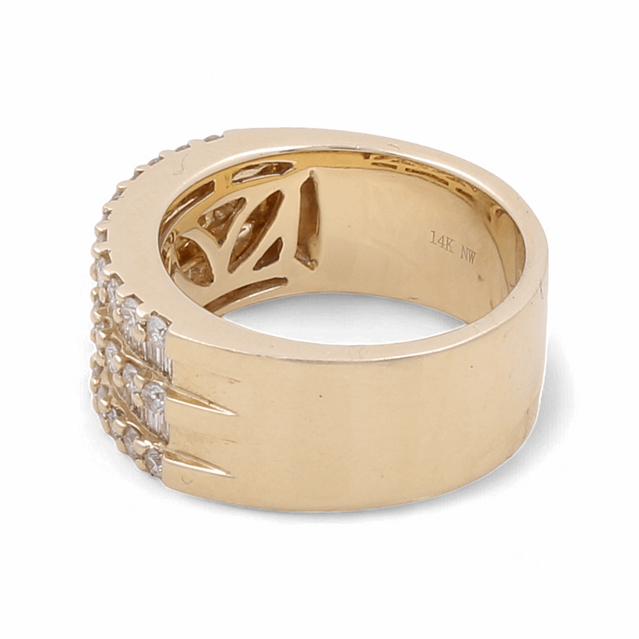 The 14K Yellow Gold Diamond Fashion Woman Ring by Miral Jewelry features a flat, wide gold band with a row of embedded stones on one side. The interior is stamped with "14K NW." This stunning piece of women's fashion jewelry is crafted in 14K yellow gold, offering both elegance and durability.