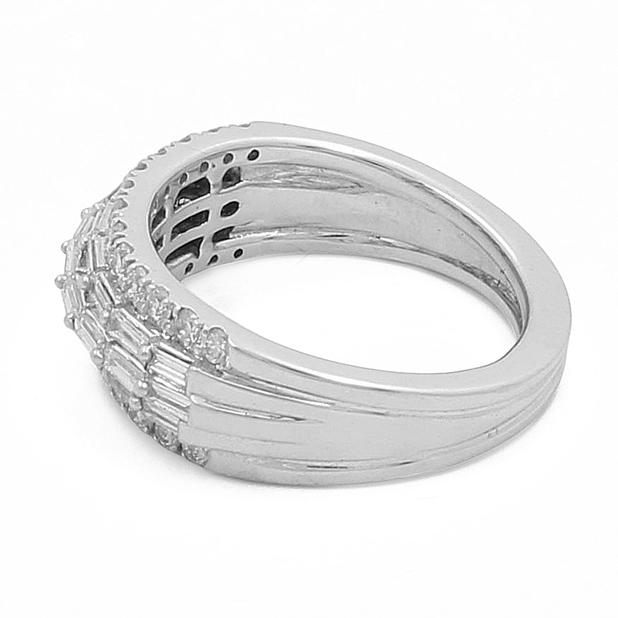 A contemporary 14k white gold ring by Miral Jewelry, featuring a multi-row band design adorned with 0.45 total weight round diamonds and 0.50 total weight baguette diamonds.