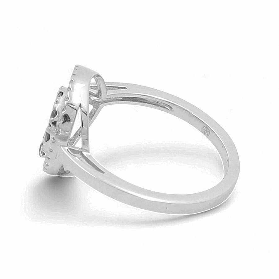 Side view of a luxurious accessory, the Miral Jewelry 14K White Gold Fashion Diamond Woman Ring, featuring a single round-cut diamond in a prong setting and boasting a simple band design.