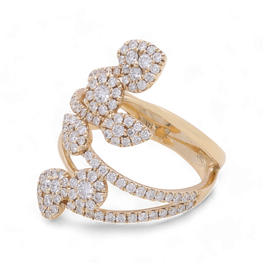 The Miral Jewelry 14K Yellow Gold Fashion Diamond Woman Ring, featuring a leaf-like design encrusted with numerous small diamonds, epitomizes luxury jewelry and stands out as the perfect statement piece.