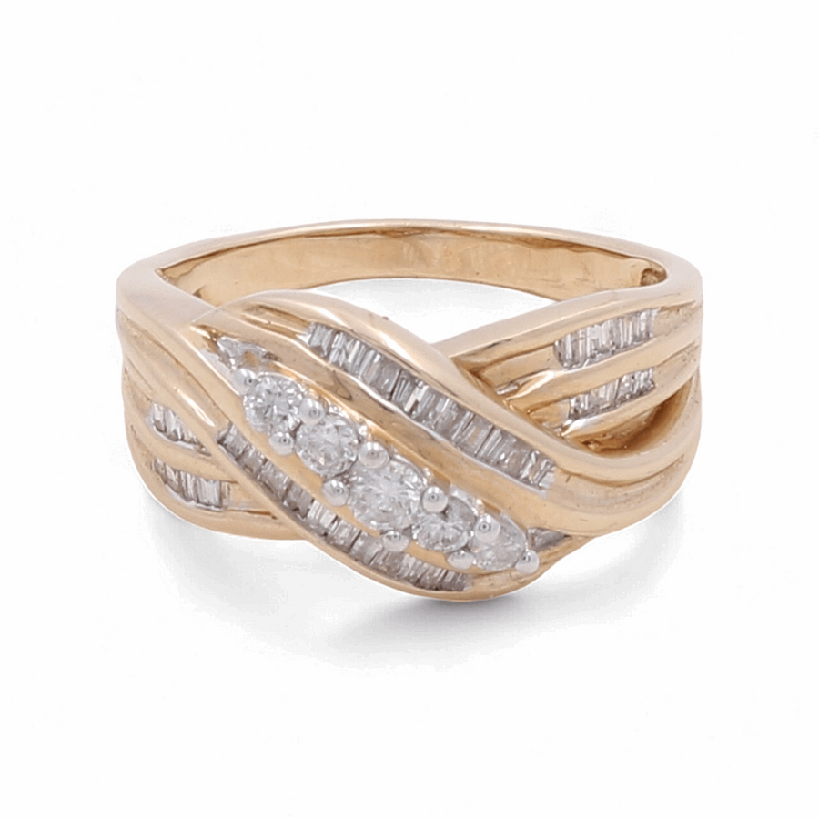 Introducing the Miral Jewelry 10K Yellow Gold Fashion Diamond Woman Ring, featuring an elegant crisscross design with sparkling small round and baguette-cut diamonds.