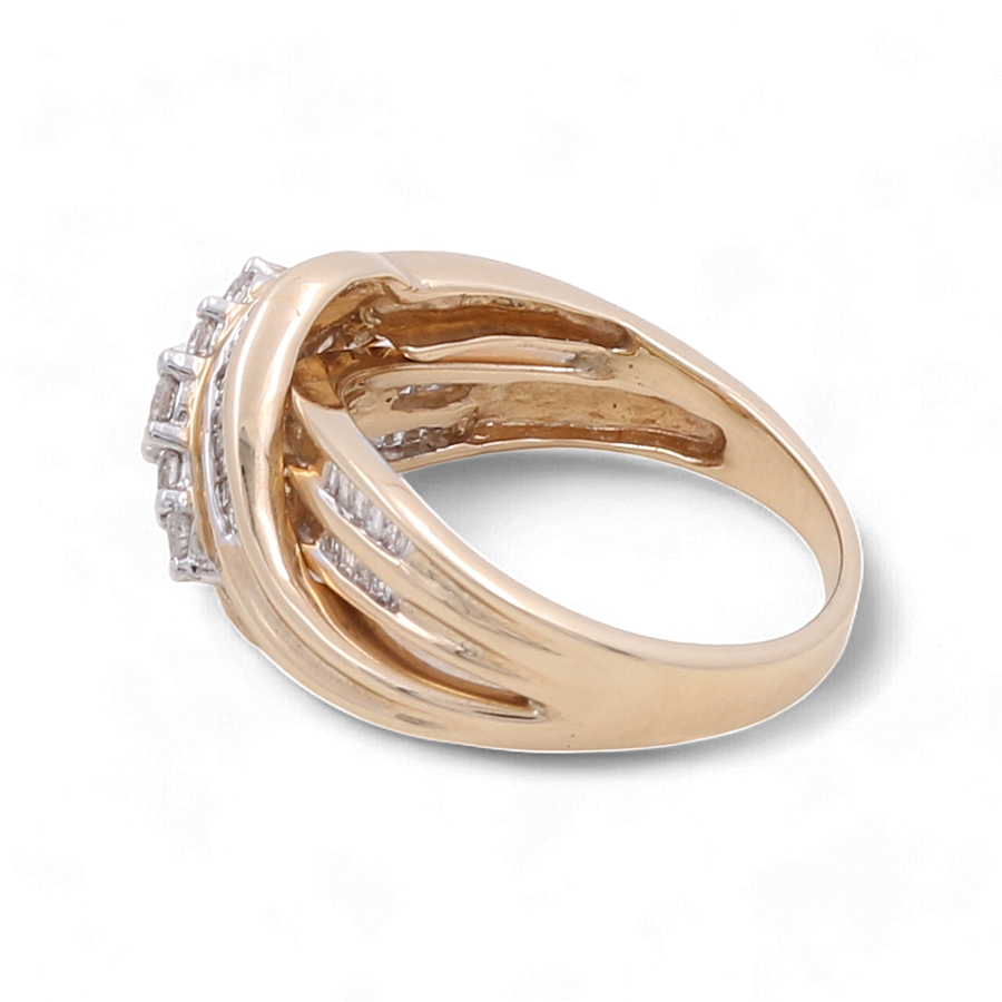 Introducing the 10K Yellow Gold Fashion Diamond Woman Ring by Miral Jewelry, featuring a stunning, intricate twist design with small embedded gemstones—perfect for the fashion-forward woman.