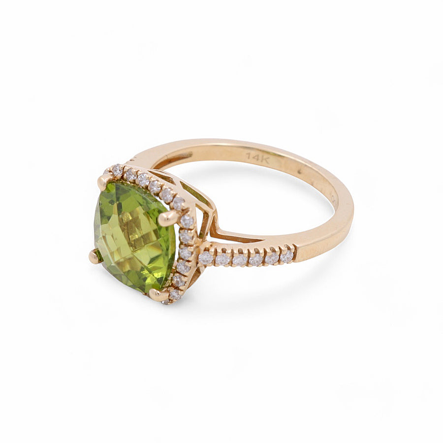 The Miral Jewelry 14K Yellow Gold Woman Fashion Ring features a stunning square-cut green gemstone, complemented by small surrounding diamonds and intricate rubies set against a white background.