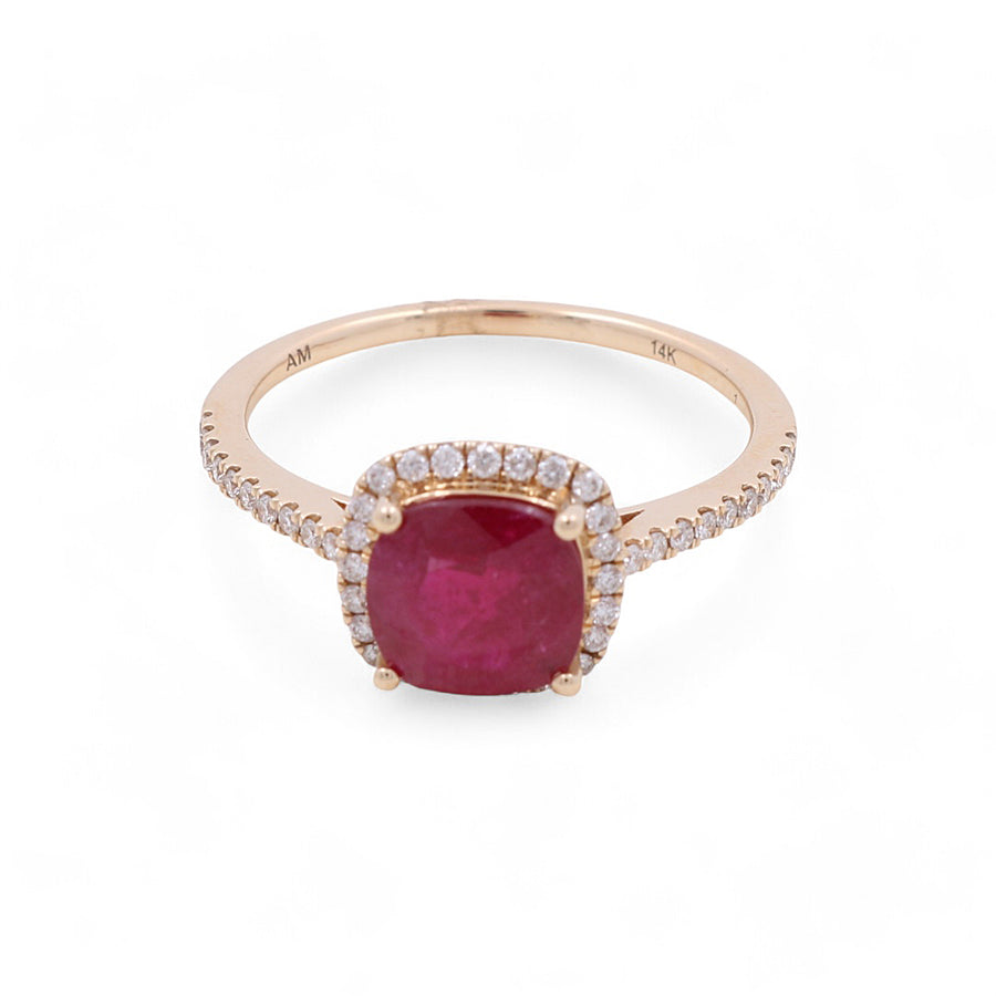 Miral Jewelry presents the 14K Yellow Gold Woman Fashion Ring with Diamonds and Ruby—a stunning piece featuring a large square red gemstone surrounded by smaller white stones, with additional small white stones on the band.