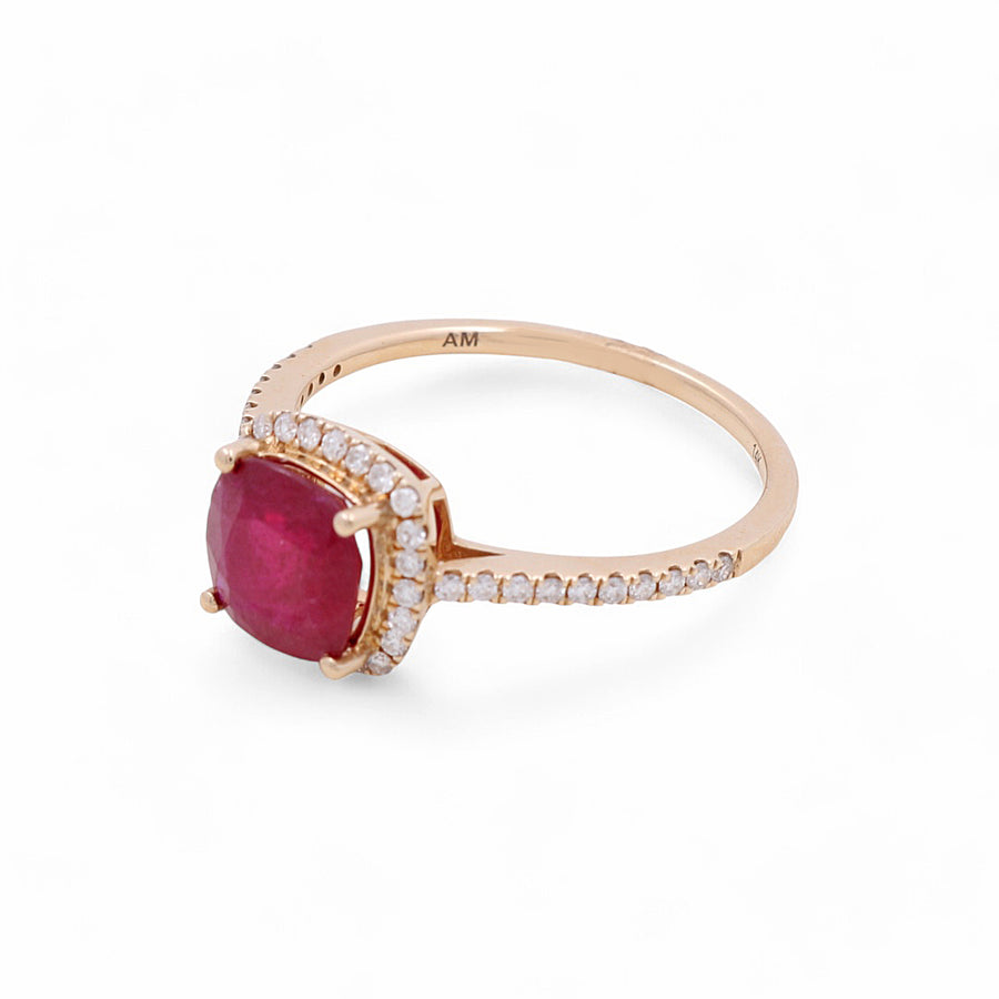 The Miral Jewelry 14K Yellow Gold Fashion Ring, named the Woman Fashion Ring with Diamonds and Ruby, features a radiant red gemstone centerpiece surrounded by small clear stones on both the band and setting. This exquisite piece is a stunning addition to any woman's jewelry collection.