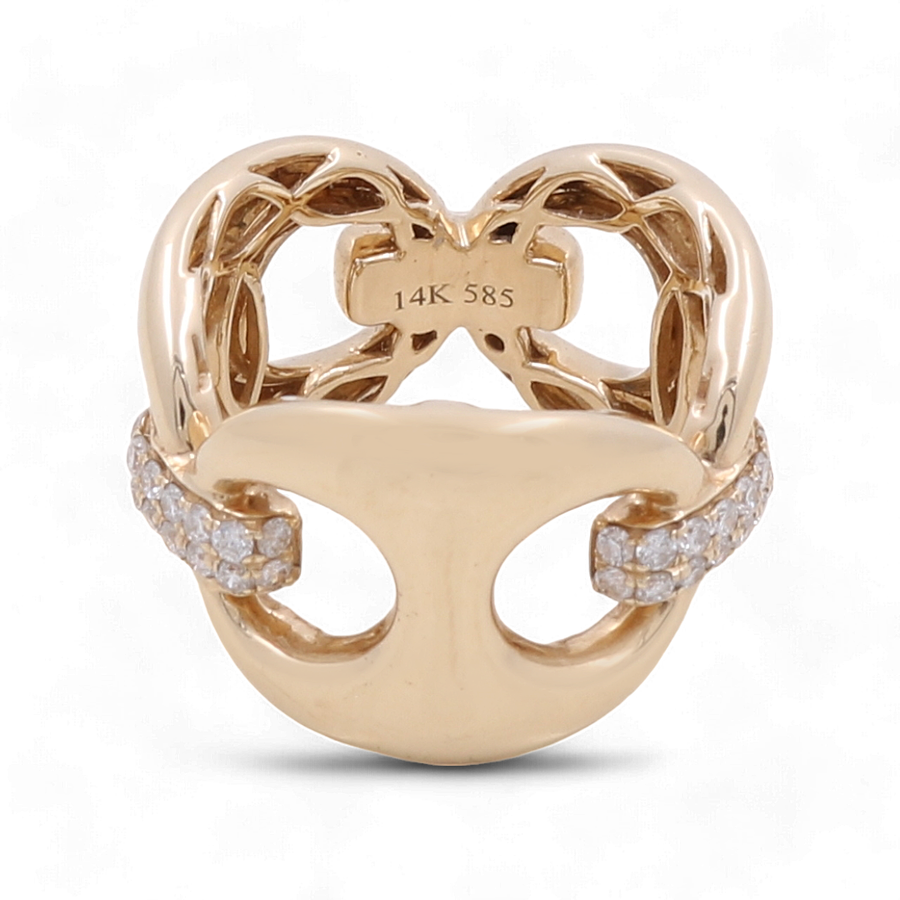 The 14K Yellow Gold Fashion Diamond Woman Ring by Miral Jewelry boasts an intricate open-heart design that exudes timeless elegance, featuring two curved bands adorned with small diamonds. The interior is marked with "14K 585".