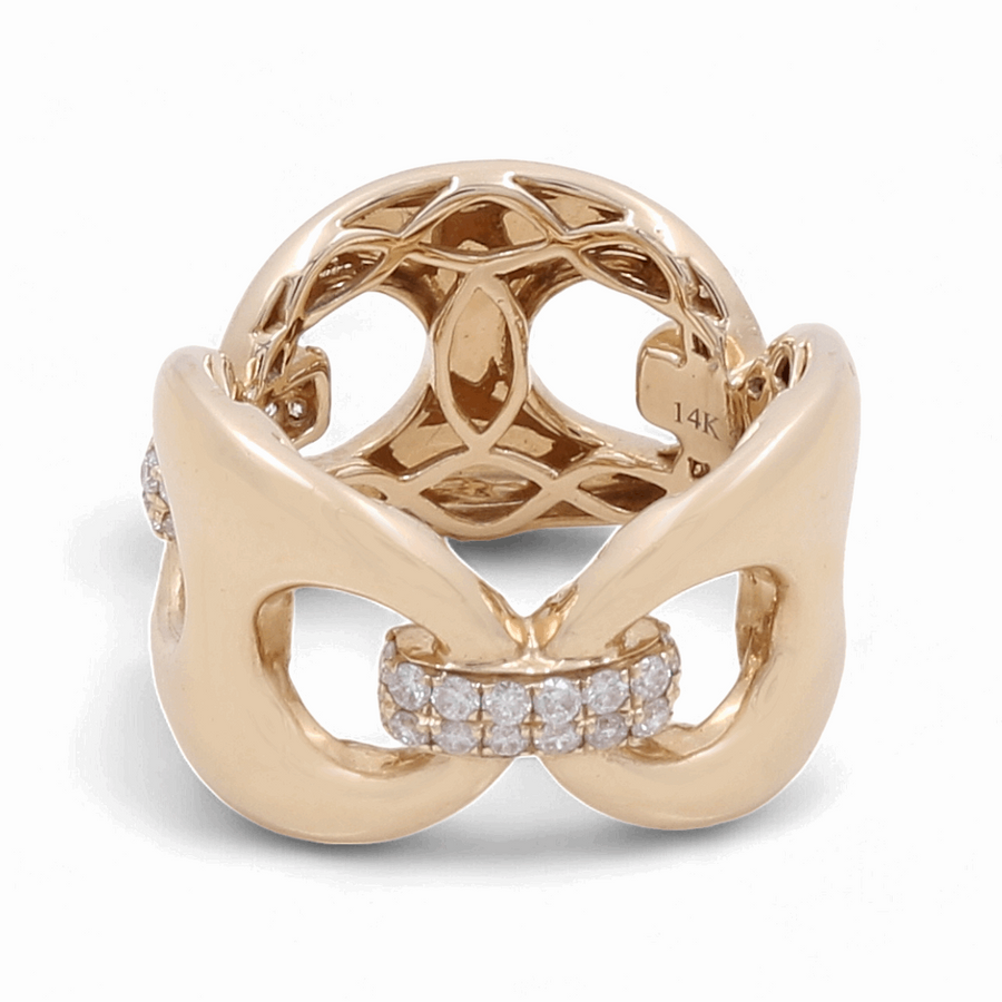 The 14K Yellow Gold Fashion Diamond Woman Ring by Miral Jewelry features a luxurious woven design with small diamonds set across the front and is engraved with "14K" inside.