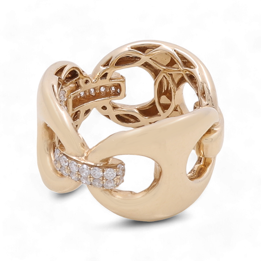 Experience elegance with the 14K Yellow Gold Fashion Diamond Woman Ring by Miral Jewelry, featuring an intricate, intertwined design adorned with small embedded diamonds – a perfect statement piece for women's jewelry.