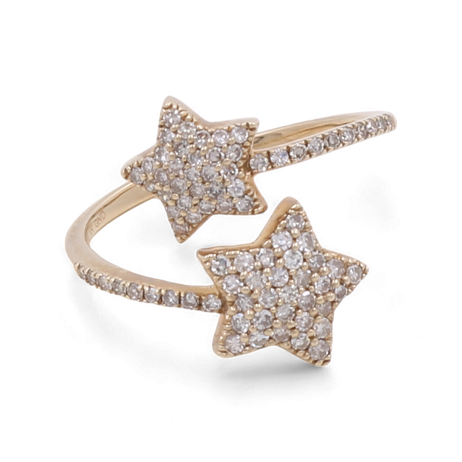 The 10K Yellow Gold Fashion Diamond Woman Ring by Miral Jewelry showcases an open design with two star-shaped accents adorned with small diamonds, making it a perfect addition to any fashion jewelry collection.