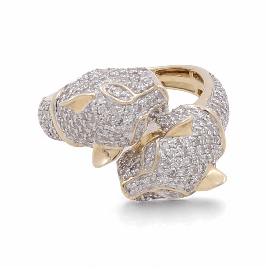 The Miral Jewelry 10K Yellow Gold Fashion Diamond Woman Ring showcases two intricately designed, diamond-encrusted panther heads facing each other, with a total weight of 0.50TW, exuding elegance and sophistication.