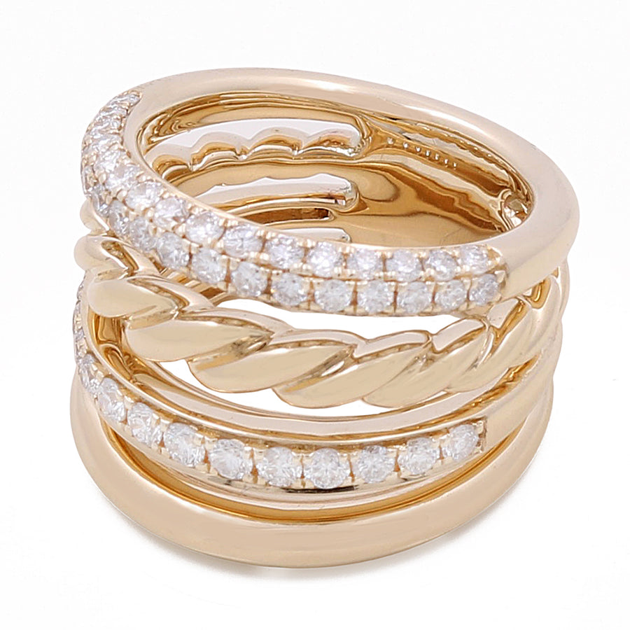 A 14k Yellow Gold Fashion Ring with 1.18Tw Round Diamonds by Miral Jewelry featuring four intertwined bands, two of which are adorned with small, round diamonds.