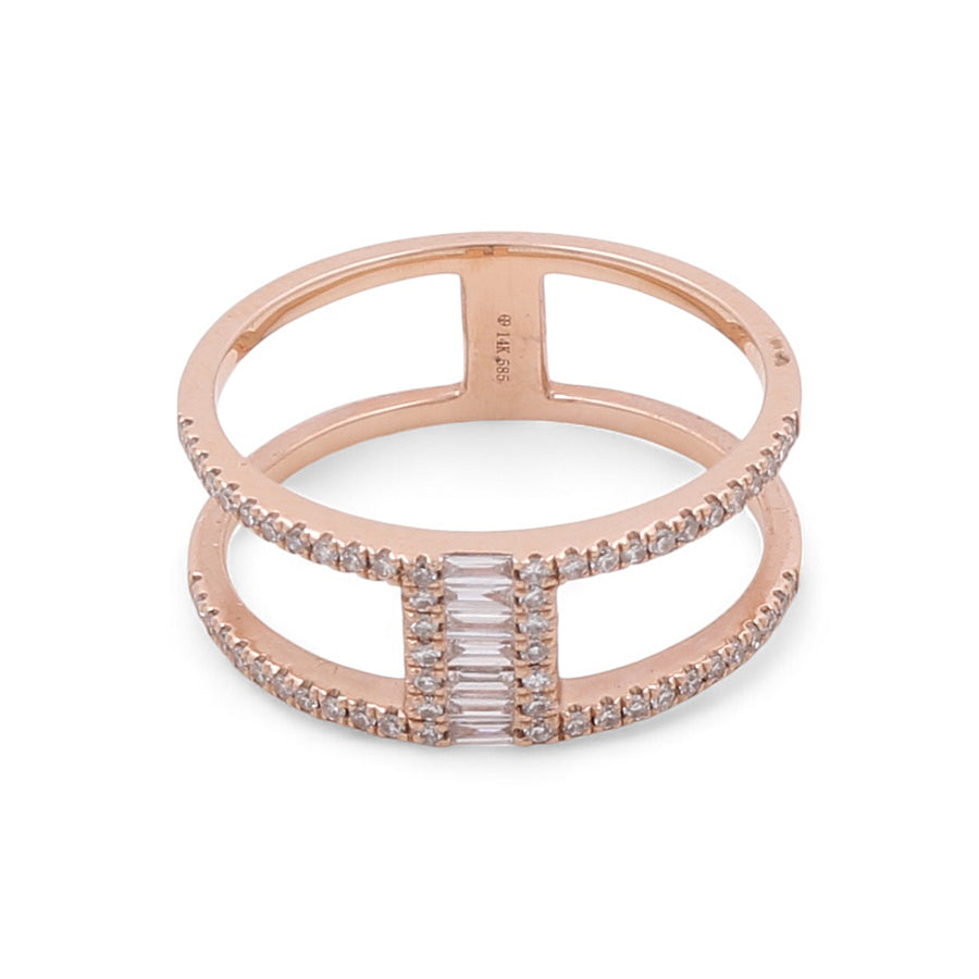 The 14K Rose Gold Fashion Diamond Women's Ring by Miral Jewelry showcases a stunning rose gold double band, embellished with small round diamonds along the edges and vertically set rectangular diamonds in the center.