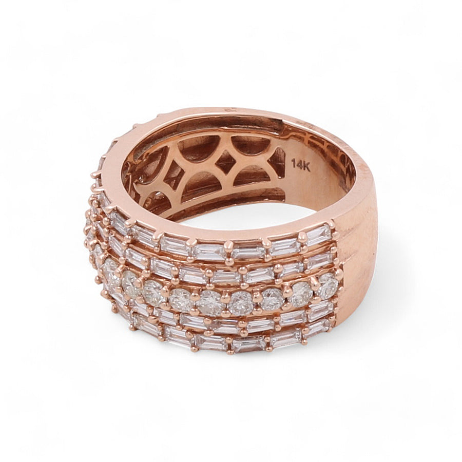 The 14K Rose Gold Fashion Diamond Women's Ring by Miral Jewelry is a stunning piece featuring three rows of round and rectangular diamonds, perfect for any occasion. This diamond women's ring is a must-have in your fashion jewelry collection, with the inside of the band elegantly labeled "14K".