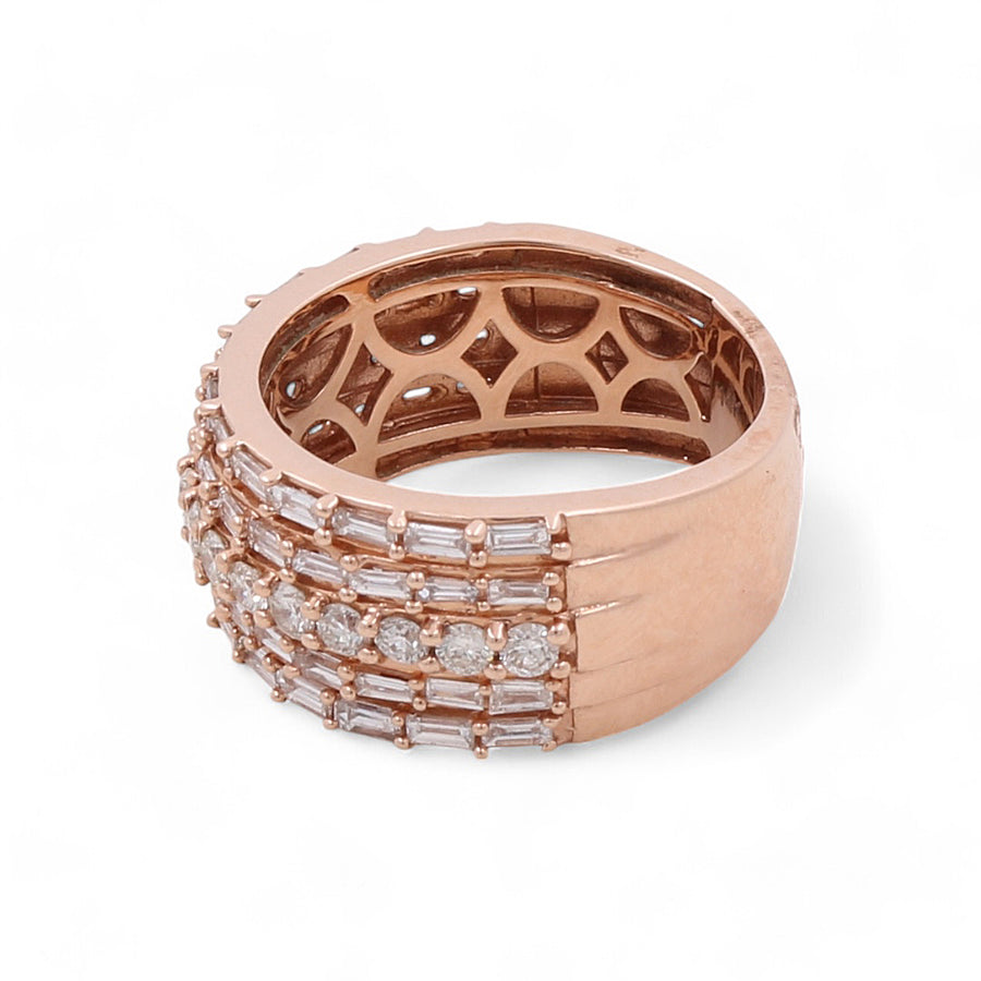 This exquisite 14K Rose Gold Fashion Diamond Women's Ring from Miral Jewelry features multiple rows of rectangular and round-cut diamonds set in an intricate pattern.