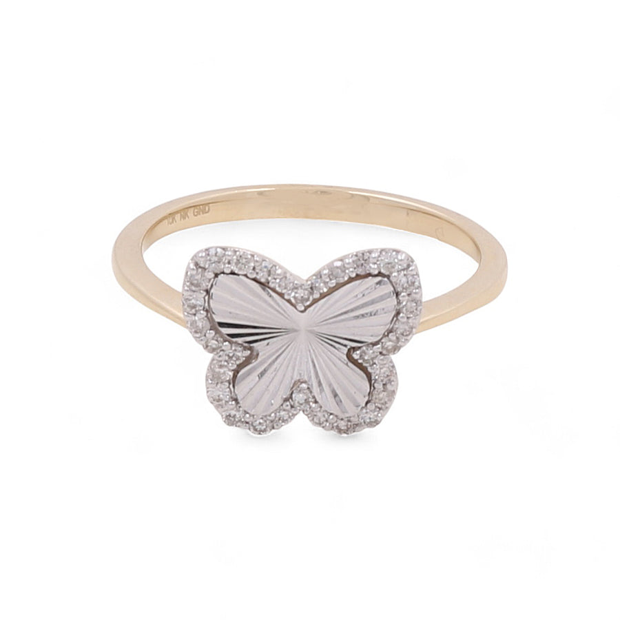 The Miral Jewelry 10K Yellow and White Gold Fashion Butterfly Diamond Women's Ring features a central butterfly design with a textured silver butterfly shape surrounded by small clear stones. This stunning addition to any women's fashion ring collection is perfect for making a statement.