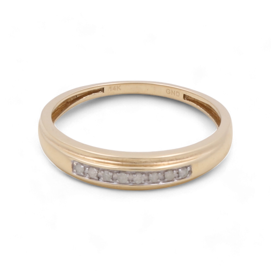 The Miral Jewelry 14K Yellow Gold Bridal Diamond Men's Ring epitomizes elegance with its small diamonds set in a row across the top.