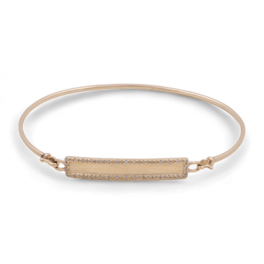 The 14K Yellow Gold Fashion Diamond Women's Bracelet from Miral Jewelry features a rectangular centerpiece bordered with small jewels, connected by two small clasps. Perfect for pairing with a fashion diamond women's necklace or other 14K yellow gold accessories.