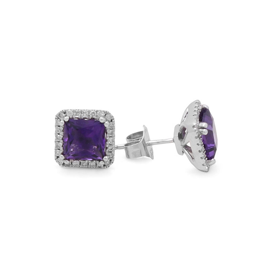 A pair of Miral Jewelry's 14K White Gold Fashion Women's Earrings features square purple amethyst gemstones, each encircled by small clear diamonds; one earring faces forward while the other is angled to the side.