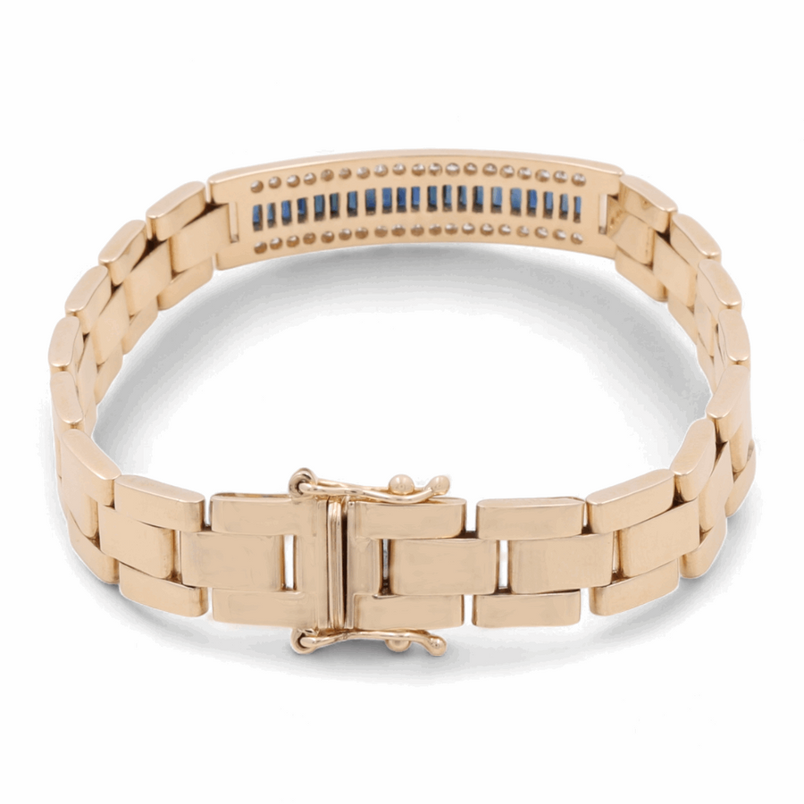 A Miral Jewelry 14K Yellow Gold Fashion Italian Bracelet with Diamonds and Sapphires, featuring rectangular Greek and Cuban links and a row of embedded blue stones on the inside.