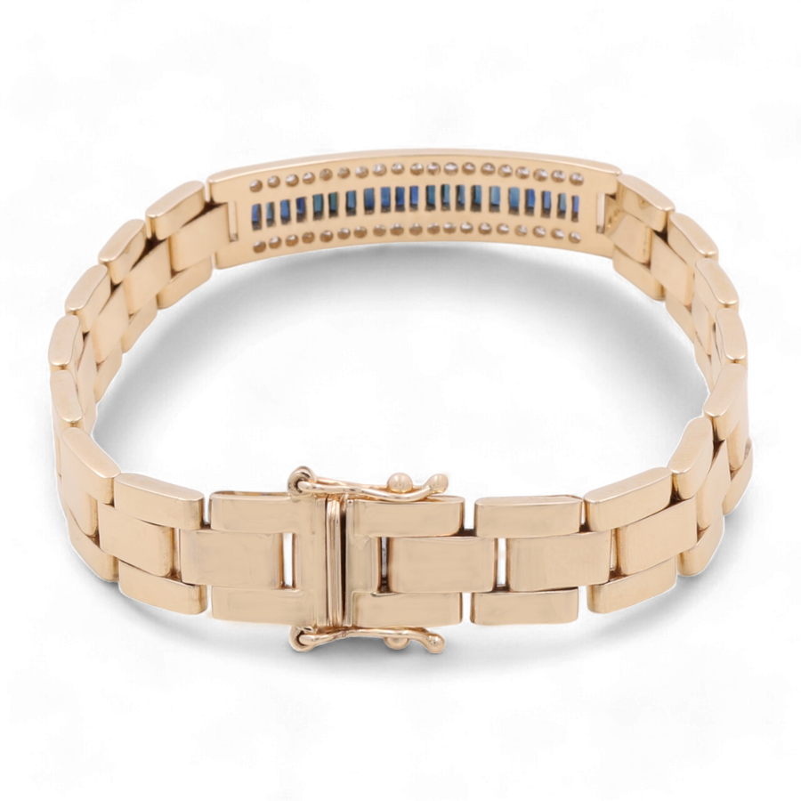 A Miral Jewelry 14K Yellow Gold Fashion Italian Bracelet with Diamonds and Sapphires, featuring rectangular Greek and Cuban links and a row of embedded blue stones on the inside.