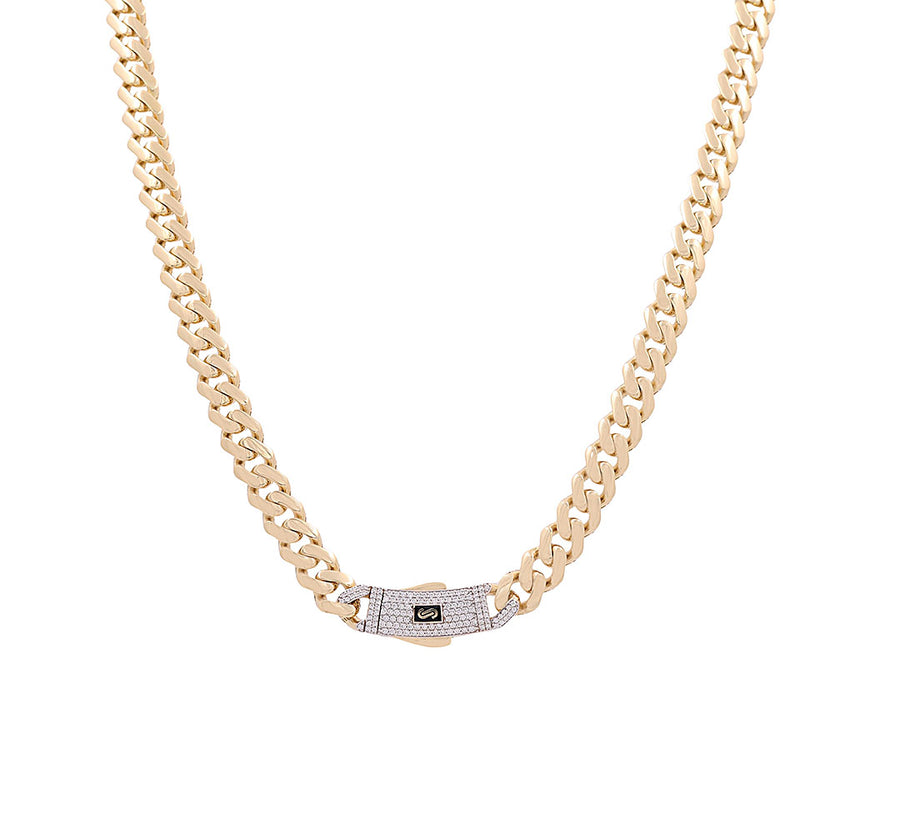 Miral Jewelry's 14K Yellow Gold Monaco Chain, measuring 24 inches, features a clasp adorned with small diamonds.