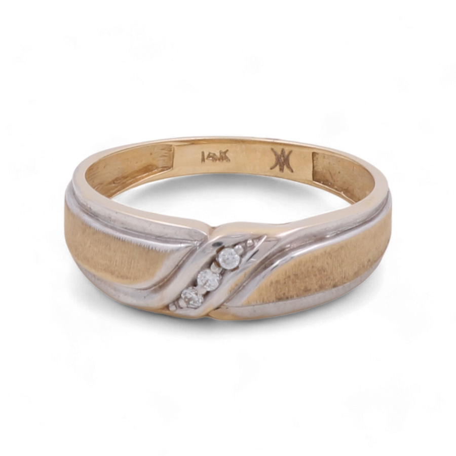 A timeless piece from Miral Jewelry, the 14K Yellow Gold Wedding Men Ring features a textured band with a silver inlay adorned with four small diamonds, set against a white background.