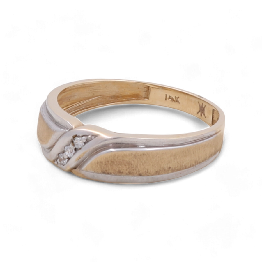 A timeless piece from Miral Jewelry, the 14K Yellow Gold Wedding Men's Ring features a captivating wave design in silver and three small diamonds set in the center.