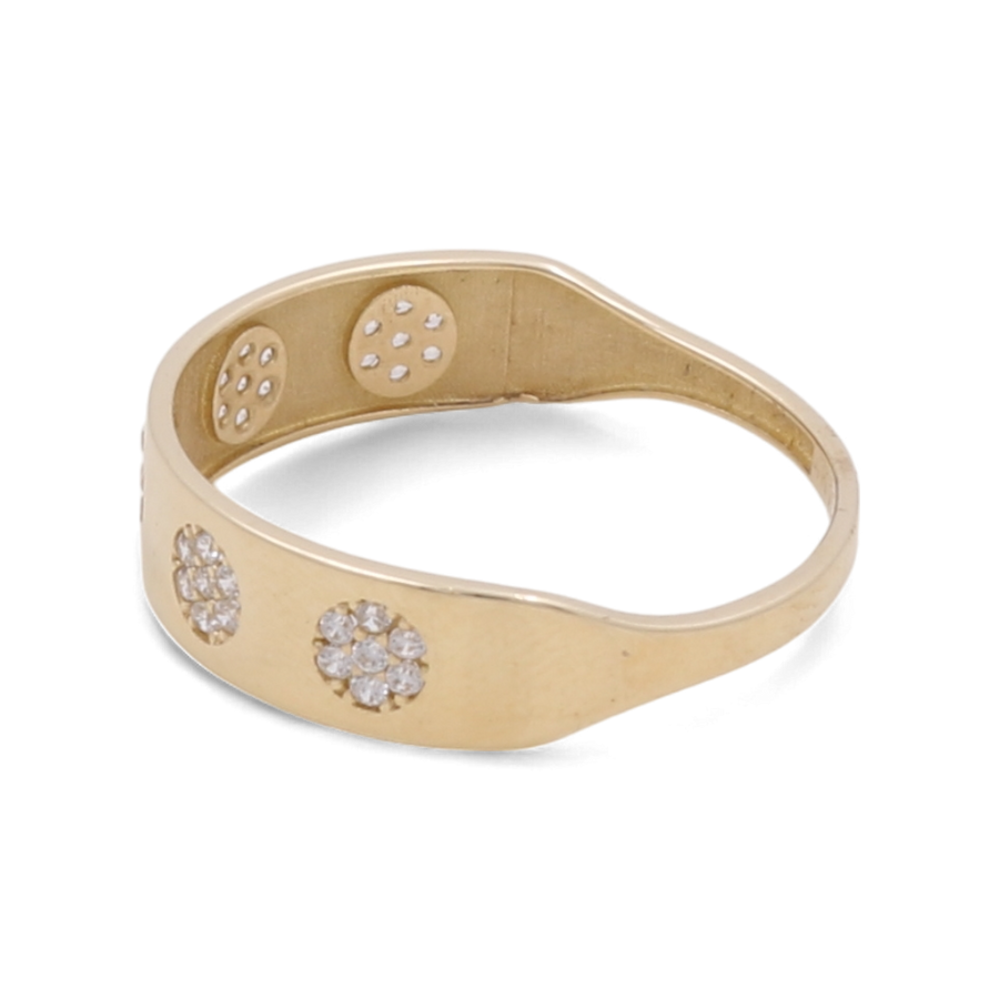 The 14K Yellow Gold Wedding Little Flowers Men Ring by Miral Jewelry is a luxurious men's wedding ring with a smooth band, adorned with three small floral design clusters of diamonds on the front and two identical clusters on the inner surface.