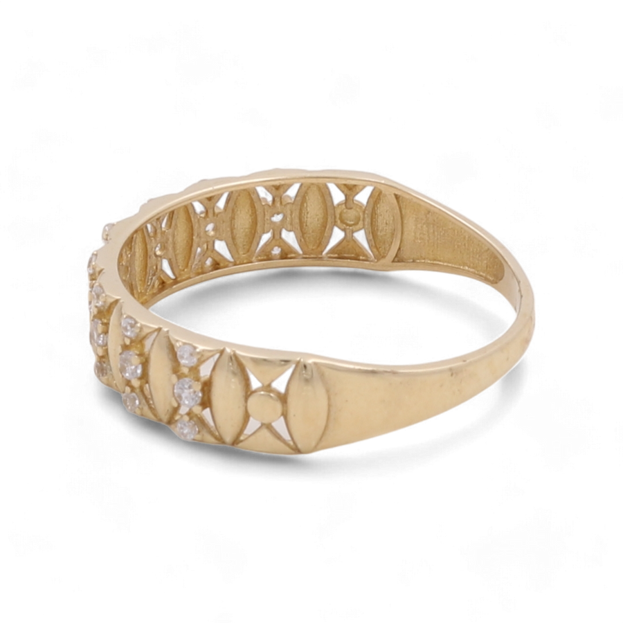 The Miral Jewelry 14K Yellow Gold Fashion Women Ring with Zirconias boasts an intricate cut-out design and small embedded zirconias on one side, making it a stunning addition to any fashion collection.